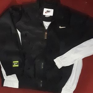 Nike wind breakerJacket kids large or ladies small